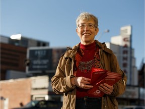 Edmonton Strathcona Communist Party of Canada candidate Naomi Rankin campaigns along 109 Street in Edmonton's Garneau neighbourhood on Oct. 11, 2019.