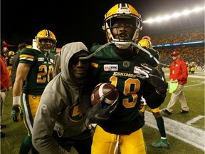 Edmonton Eskimos' Tyquwan Glass (19) celebrates an interception with teammates on the BC Lions during second half CFL action at Commonwealth Stadium in Edmonton, on Saturday, Oct. 12, 2019.