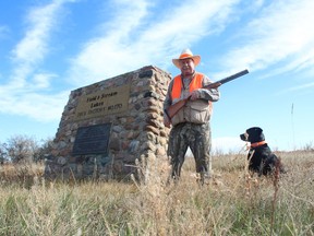 Neil Waugh and Stella at Eltinge Warner's cairn