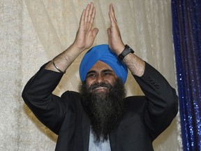 Tim Uppal, Conservative Party of Canada candidate for Edmonton-Mill Woods, celebrates after defeating incumbent Amarjeet Sohi (Liberal Party of Canada) in the federal election on October 21, 2019.