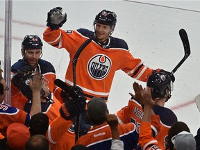 Edmonton Oilers and fans celebrate Leon Draisaitl's overtime goal against the Washington Capitals during NHL action at Rogers Place in Edmonton on Thursday, Oct. 2, 2019.