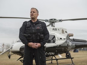 Edmonton Police Service chief pilot Murray Maschmeyer with Air 1 talks on Wednesday, Oct. 30, 2019, about a 41-year-old man who was charged with pointing a laser pointer at the police helicopter on Saturday, Oct. 26, 2019