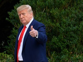 U.S. President Donald Trump gestures as he arrives at the White House in Washington, D.C., on Oct. 3, 2019 after returning from an event in Florida. (JIM WATSON/AFP via Getty Images)