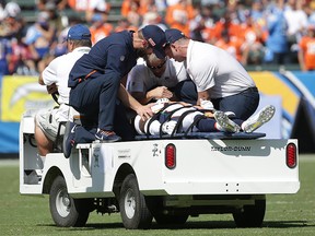 De’Vante Bausby of the Denver Broncos is carted off the field against the Los Angeles Chargers at Dignity Health Sports Park on October 6, 2019 in Carson, California. (Jeff Gross/Getty Images)