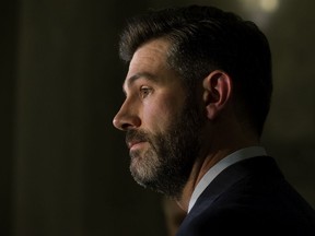 Edmonton Mayor Don Iveson speaks to the media at the Alberta legislature after the Alberta 2019 budget was delivered in Edmonton on Thursday, Oct. 24, 2019.