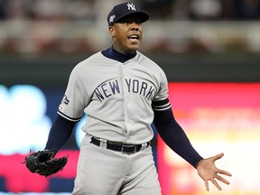 Aroldis Chapman of the New York Yankees celebrates defeating the Minnesota Twins to advance to the American League Championship Series at Target Field on October 7, 2019 in Minneapolis. (Elsa/Getty Images)