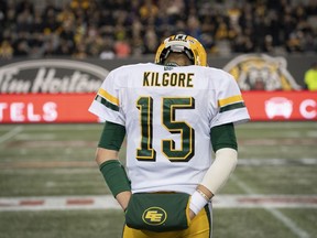 Edmonton Eskimos quarterback Logan Kilgore (15) looks on from the sidelines late in the second half CFL football game action against the Hamilton Tiger Cats, in Hamilton, Ont., Friday, Oct. 4, 2019.