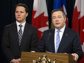 Premier Jason Kenney with Devin Dreeshen, Minister of Agriculture and Forestry, on Tuesday, May 21, 2019, in Edmonton. (Greg Southam-Postmedia)