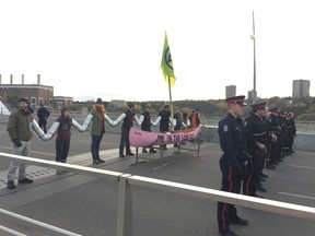 Climate activists blocked one of the city's major arteries into downtown Edmonton during the Monday morning commute on Oct. 7, 2019. Starting at 7 a.m. activists with Extinction Rebellion Edmonton, began using "non-violent direct action to prevent catastrophic climate and ecological breakdown" to block traffic along the Walterdale Bridge.  Anna Junker