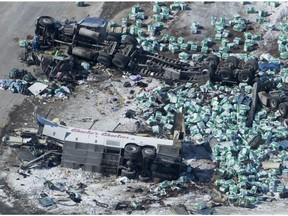 Aerial photo on April 7, 2018, shows wreckage after a bus carrying the Humboldt Broncos hockey team and a tractor-trailer collided outside of Tisdale, Sask.
