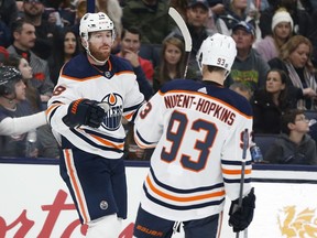 CP-Web.  Edmonton Oilers' James Neal, left, celebrates his goal against the Columbus Blue Jackets with teammate Ryan Nugent-Hopkins during the first period of an NHL hockey game Wednesday, Oct. 30, 2019, in Columbus, Ohio.