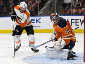 The Edmonton Oilers' goalie Mikko Koskinen (19) makes a save against the Philadelphia Flyers' Sean Couturier (14) during third period NHL action at Rogers Place, in Edmonton Wednesday Oct. 16, 2019. The Oilers won 6-3. Photo by David Bloom