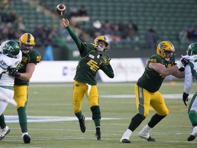 The Edmonton Eskimos' quarterback Trevor Harris (7) battles the Saskatchewan Roughriders during first half CFL action at Commonwealth Stadium in Edmonton Saturday Oct. 26, 2019.