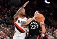 Toronto Raptors guard Fred VanVleet drives to the basket against Portland Trail Blazers guard Damian Lillard during Wednesday's game. (USA TODAY SPORTS)