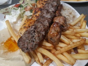The Turquaz Trio - left to right, chicken, beef kafta and lamb with fries, rice, salad, hummus and garlic spread. Photos by GRAHAM HICKS / EDMONTON SUN