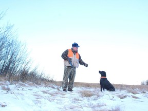 Neil Waugh and Stella on a snow day pheasant hunt.