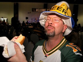 Rod Yaremchuk enjoys a Lobster Roll at the Atlantic Schooners Team Party as thousands of fans join the Grey Cup celebrations at the BMO Centre on Friday, November 22, 2019.