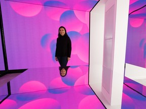 Zamina Walji, Aurora Cannabis vice-president retail and consumer strategy, gives a tour of the largest cannabis retail and experience store in Canada at West Edmonton Mall in Edmonton on Tuesday, Nov. 26, 2019.