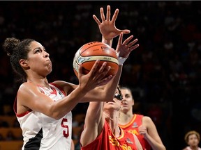 Canada guard Kia Nurse, left, vies with Spain's center Laura Gil during the FIBA 2018 Women's Basketball World Cup quarter final  match between Canada and Spain at the Santiago Martin arena in San Cristobal de la Laguna on the Canary island of Tenerife on Sept. 28, 2018.