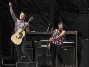 Dierks Bentley, left, performs with his band on the main stage at Big Valley Jamboree 2016 in Camrose on July 29, 2016. The country star will return to Big Valley Jamboree in 2020.