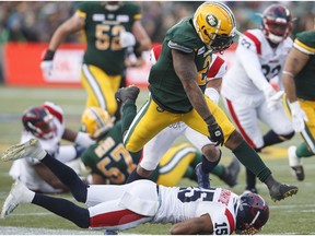 Mntreal Alouettes' Marcus Cromartie (15) misses the tackle on Edmonton Eskimos' C.J. Gable (2) during first half CFL action in Edmonton on Friday June 14, 2019.