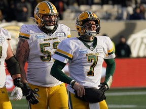 Nov 17, 2019; Hamilton, Ontario, CAN; Edmonton Eskimos  quarterback Trevor Harris (7) reacts after beicg sacked by the Hamilton Tiger-Cats during the CFL Eastern Conference Final football game  at Tim Hortons Field. Mandatory Credit: John E. Sokolowski-USA TODAY Sports ORG XMIT: USATSI-421954