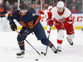 Detroit Red Wings forward Jacob de la Rose (61) chases Edmonton Oilers forward Tomas Jurco (92) up the ice during the third period  at Rogers Place.