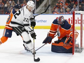 Edmonton Oilers goaltender Mike Smith (41) makes a save on Los Angeles Kings forward Trevor Lewis (22) during the second period at Rogers Place.