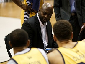 Edmonton Stingers head coach and general manager Jermaine Small  speaks with players as they battle the Fraser Valley Bandits during the second half of a CEBL game at the Edmonton Expo Centre in Edmonton on, Aug. 1, 2019.