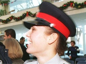 Melony Gushnowski, shown here at her graduation into the police service in 1997, says the EPS has discriminated against her on the basis of gender, family status and mental and/or physical disability, which are protected characteristics under the Alberta Human Rights Act.