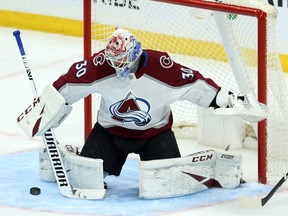 Colorado Avalanche goaltender Adam Werner makes a save on Tues., Nov. 12, 2019 in his NHL debut in Winnipeg. (KEVIN KING/Postmedia Network)