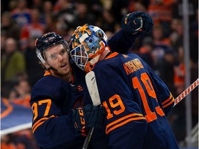 Connor McDavid #97 and goaltender Mikko Koskinen #19 of the Edmonton Oilers celebrate their victory against the Los Angeles Kings at Rogers Place on December 6, 2019 in Edmonton.