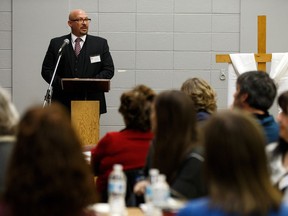 John Fiacco, Assistant Superintendent, Educational Planning Services with Edmonton Catholic School District, gives a presentation during a public meeting about the potential closure of St. Gabriel Catholic School in Edmonton, on Wednesday, Jan. 30, 2019. Photo by Ian Kucerak/Postmedia
