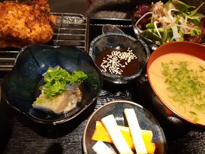 Dorinku Osaka's pork katsu, from the restaurant's noon menu, is presented with a variety of smaller dishes. Photos by GRAHAM HICKS / EDMONTON SUN