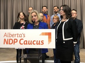 Flanked by and leaders of Edmonton community leagues and other grassroots groups, NDP culture critic Nicole Goehring, joined by NDP Leader Rachel Notley, said government cuts to some community grants threaten key programs and services the groups offer. She spoke during a press conference at the legislature in Edmonton Wednesday, December 4, 2019. Janet French/Postmedia
