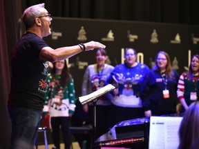 Director Emmanuel (Mannie) Fonte conducting the rehearsal for the 50th anniversary, and last outing, of the Singing Christmas Tree in Edmonton on Dec. 8, 2019.
