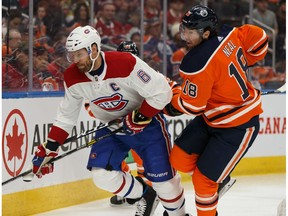 Edmonton Oilers James Neal (18) battles Montreal Canadiens' Shea Weber (6) during first period NHL hockey action at Rogers Place in Edmonton, on Saturday, Dec. 21, 2019.