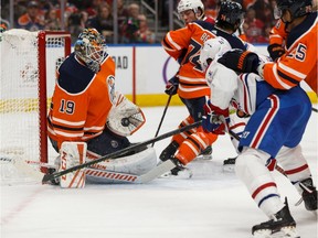 Edmonton Oilers goaltender Mikko Koskinen (19) stops Montreal Canadiens' Brendan Gallagher (11)  during second period NHL hockey action at Rogers Place in Edmonton, on Saturday, Dec. 21, 2019.