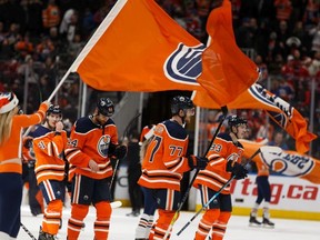 The Edmonton Oilers celebrate the team's 4-3 victory over the Montreal Canadiens at Rogers Place in Edmonton, on Saturday, Dec. 21, 2019.