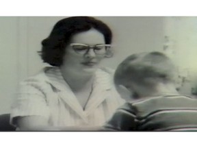 Maxine Bradley volunteering by teaching Cam Tait to use his hands in 1965