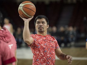 Former Boxer and current Senator of the Philippines Manny Pacquiao played basketball with his squad called Team Pacquiao at the Edmonton Expo Centre on December 28, 2019.