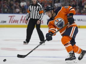 Edmonton Oilers defenceman Matt Benning takes a shot against the Philadelphia Flyers during NHL action at Rogers Place on Oct. 16, 2019.