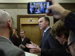 Minister of Finance Bill Morneau makes an announcement on lowering taxes for the middle class in the Foyer of the House of Commons on Parliament Hill in Ottawa, on Monday, Dec. 9, 2019.