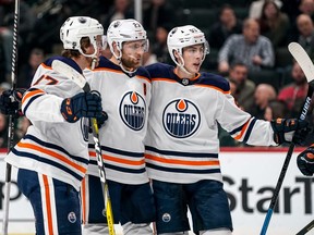 Dec 12, 2019; Saint Paul, MN, USA; Edmonton Oilers forward Leon Draisaitl (29) celebrates his goal with teammates during the second period against the Minnesota Wild at Xcel Energy Center. Mandatory Credit: Brace Hemmelgarn-USA TODAY Sports ORG XMIT: USATSI-405486