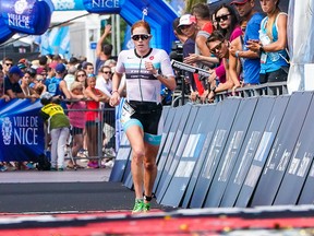 Paula Findlay of Edmonton crosses the finish line at the Ironman 70.3 Indian Wells La Quinta on Saturday Dec. 14, 2019.