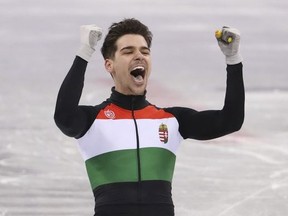 Gold medallist Csaba Burjan of Hungary reacts.