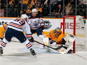 Goalie Pekka Rinne #35 of the Nashville Predators deflects a shot by Sam Gagner #89 of the Edmonton Oilers during the second period at Bridgestone Arena on February 25, 2019 in Nashville, Tennessee.