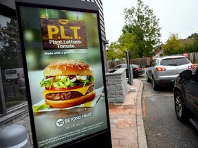 A sign promoting McDonald's "P.L.T." burger with a Beyond Meat plant-based patty at one of 28 test restaurant locations in London, Ont., Oct. 2, 2019. (REUTERS/Moe Doiron/File Photo)