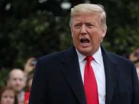 U.S. President Donald Trump talks to reporters as he departs for travel to New Orleans, La., from the South Lawn of the White House in Washington, U.S., Jan. 13, 2020. (REUTERS/Leah Millis/File Photo)