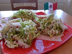Calle Mexico's tostadas, dressed with the usual ingredients. Photos by GRAHAM HICKS / EDMONTON SUN